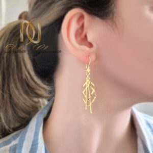 گوشواره نقره زنانه طلایی روی گوش