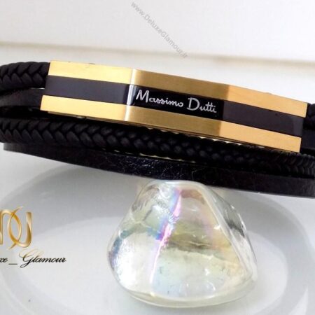 دستبند چرمی massimo dutti چند ردیفه مردانه مشکی-طلایی ds-n145 بر روی سنگ