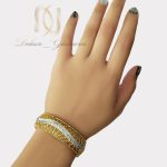 دستبند زنانه استیل طلایی دو رنگ pr-b133 از نمای روی دست