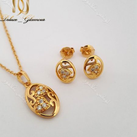نیم ست قلبی ظریف دخترانه نگین دار استیل رنگ طلایی Ns-n130 عکس روی سطح صاف