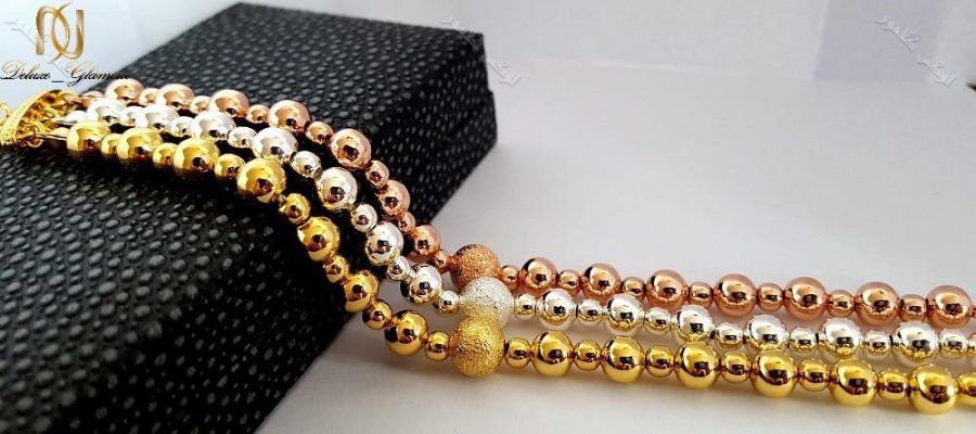 دستبند دخترانه سه ردیفه طرح توپی با سه ردیف رزگلد،طلایی و نقره ای کلیو Ds-n168 عکس از نزدیک