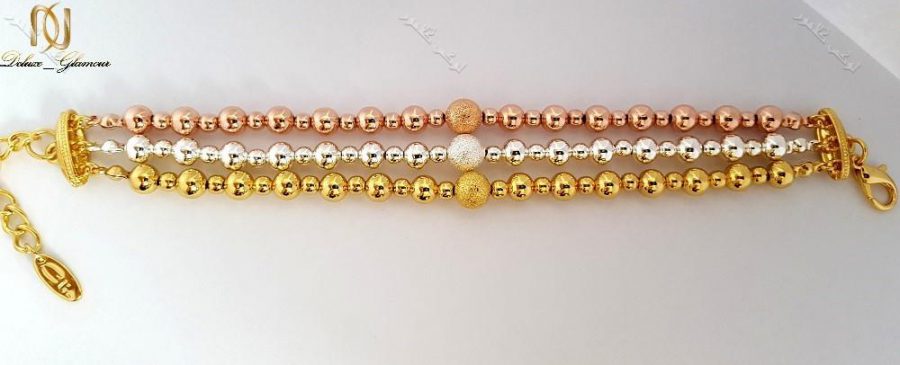 دستبند دخترانه سه ردیفه طرح توپی با سه ردیف رزگلد،طلایی و نقره ای کلیو Ds-n168 عکس باز شده ی دستبند
