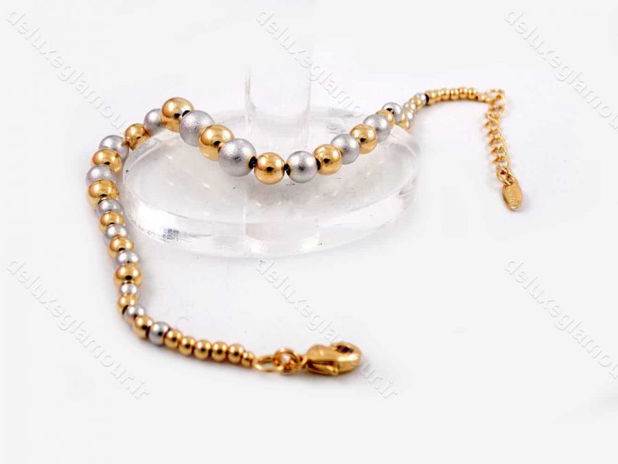 دستبند دخترانه ژوپینگ با طرح گوی دو رنگ طلایی و نقره ای ds-n180 از نمای بالا