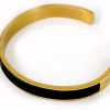 دستبند مردانه فلزی طلایی نیم باز طرح مونت بلانک ds-n204 از نمای بالا