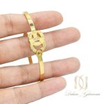 دستبند زنانه طرح چنل استیل طلایی ds-n496 از نمای روی دست