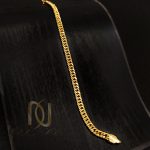 دستبند ژوپینگ زنانه ظریف طلایی کارتیه ds-n695 از نمای مشکی