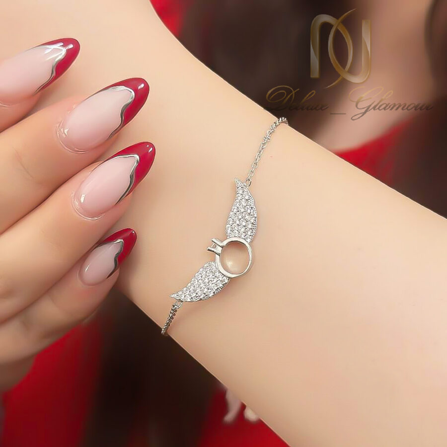 دستبند نقره دخترانه حلقه و بال فرشته روی دست