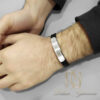 دستبند اسپرت مردانه رولکس چرم و استیل رویه نقره ای عکس روی دست