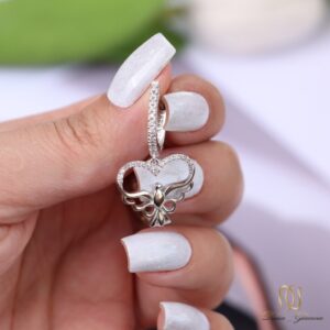 نیم ست نقره زنانه طرح قلب و پرنده ce-new-46 عکس دست holding dangler earring با طرح پرنده در قلب
